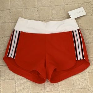 Athlete bright orange ascender shorts